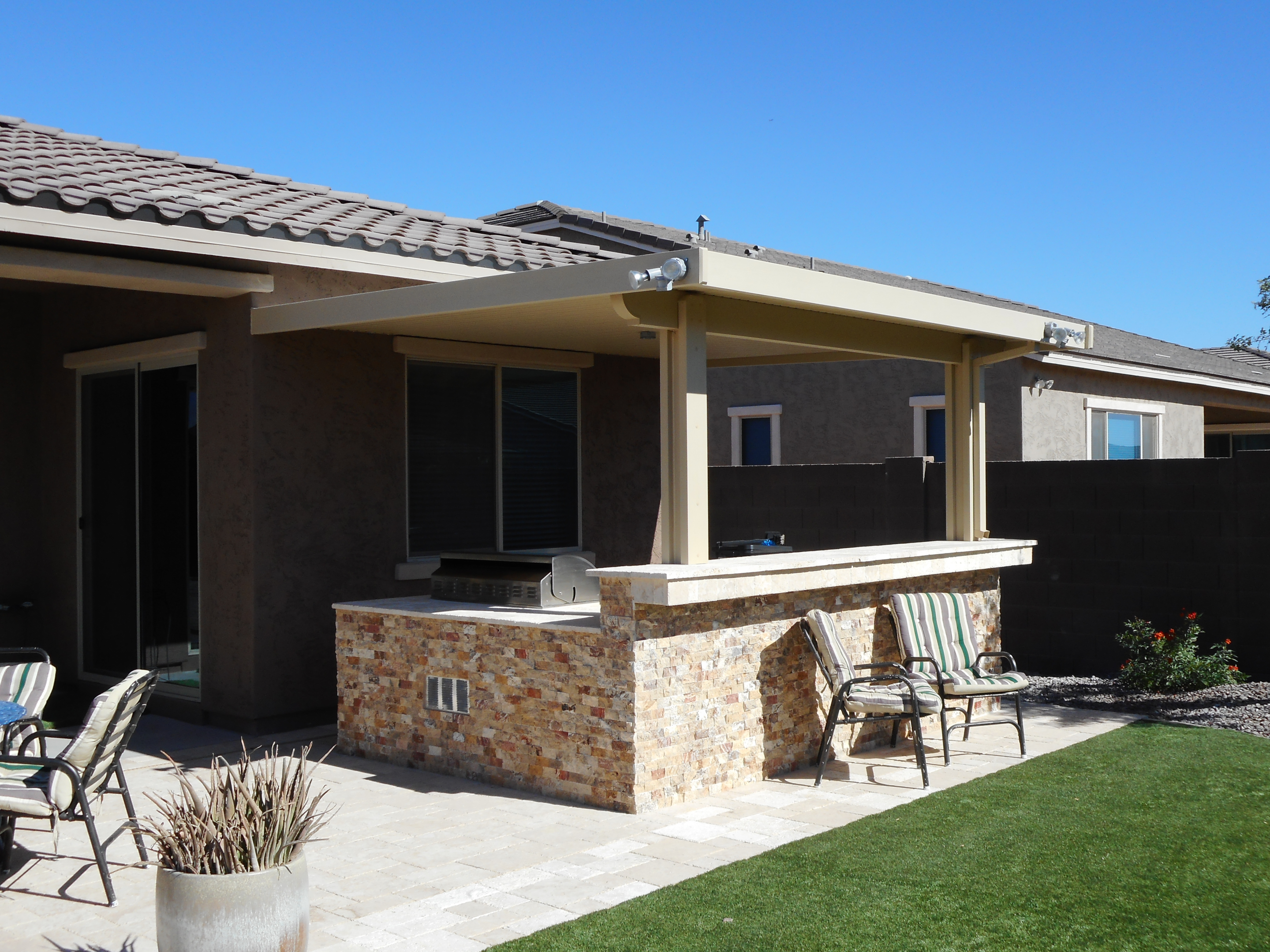 Transformed outdoor living space with Alumawood patio cover