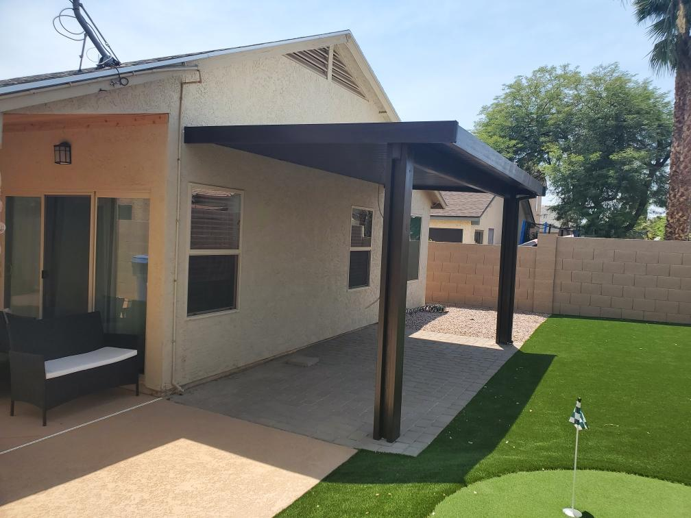 Alumawood patio cover with wood-grain texture